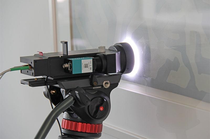 alphaCART Raman probe in front of a framed picture